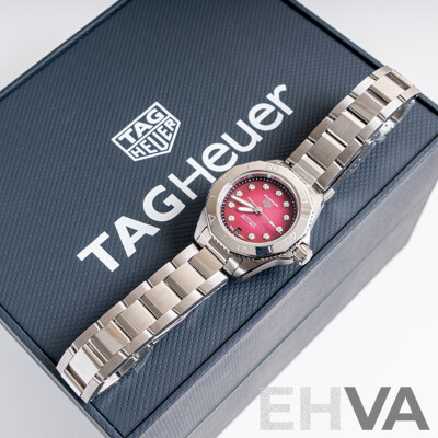 Brand New Tag Heuer 30mm Aquaracer Professional 200 Date with Mother of Pearl and Diamond Face. Model WBP2414.BA0622