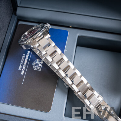 Brand New Tag Heuer 30mm Aquaracer Professional 200 Date with Mother of Pearl and Diamond Face. Model WBP2414.BA0622
