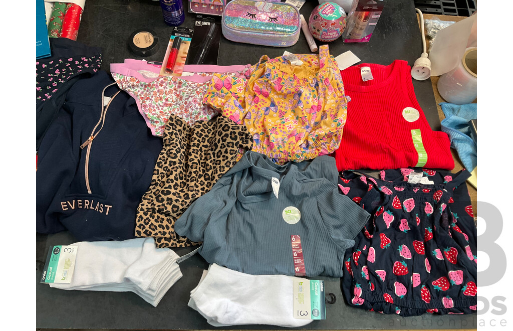 Asorted Lot of Childrens Clothing, Cosmetics, Toys and Christmas Wrapping Paper