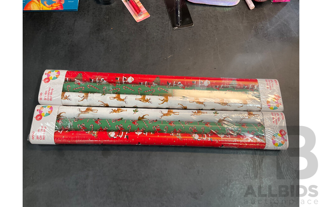 Asorted Lot of Childrens Clothing, Cosmetics, Toys and Christmas Wrapping Paper