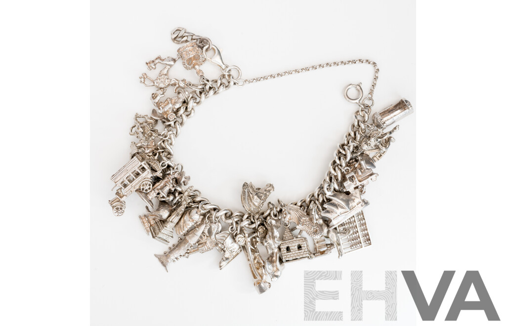 Vintage Sterling Silver Curb Link Bracelet with Safety Chain & (36) Sterling Silver Vintage Charms, 124.0 Grams