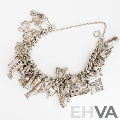 Vintage Sterling Silver Curb Link Bracelet with Safety Chain & (36) Sterling Silver Vintage Charms, 124.0 Grams