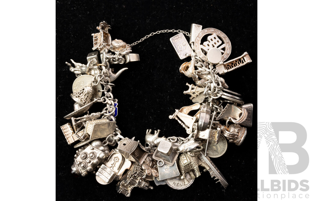 Vintage Mexican Sterling Silver Charm Bracelet with (56) Vintage Silver Charms, 148.0 Grams