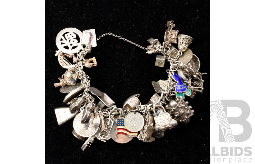 Vintage Mexican Sterling Silver Charm Bracelet with (56) Vintage Silver Charms, 148.0 Grams