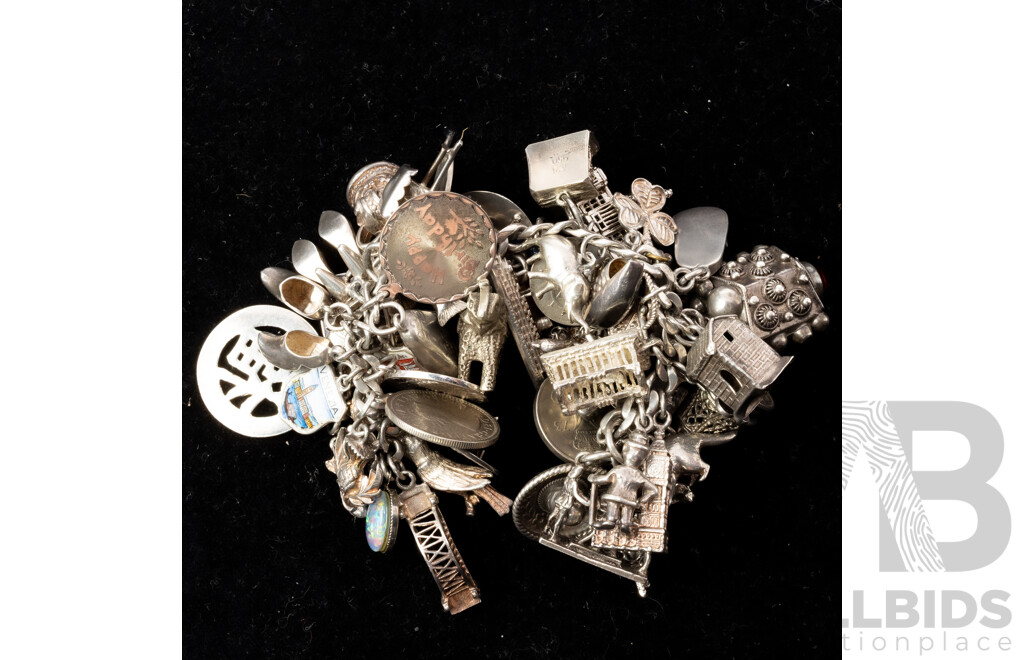 Vintage Mexican Sterling Silver Charm Bracelet with (56) Vintage Silver Charms, 148.0 Grams
