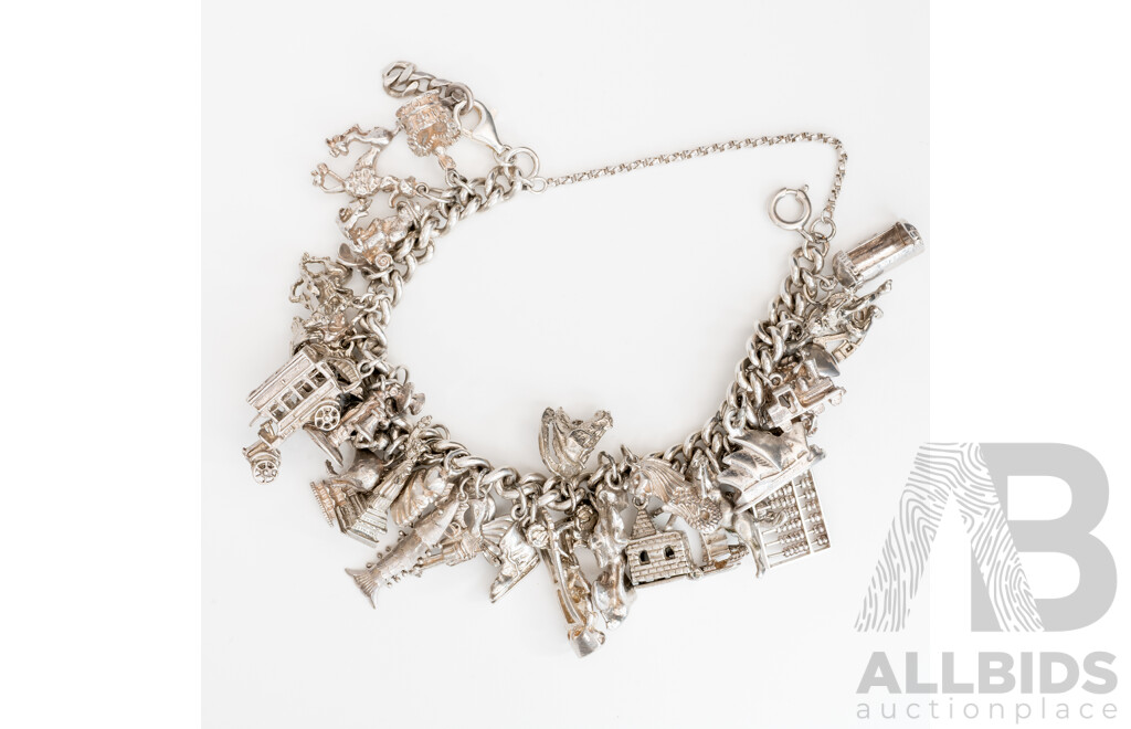 Vintage Sterling Silver Curb Link Bracelet with Safety Chain & (36) Sterling Silver Vintage Charms, 124.0 Grams