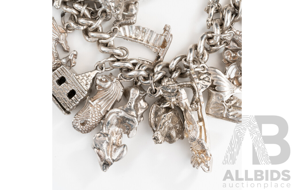 Vintage Sterling Silver Curb Link Bracelet with Safety Chain & (36) Sterling Silver Vintage Charms, 124.0 Grams