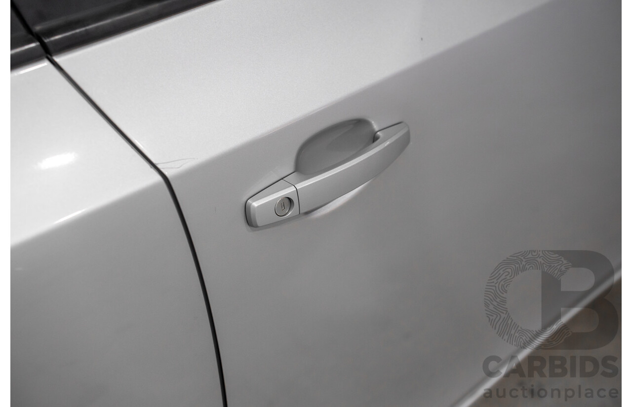 10/2009 Holden Cruze CD JG 4d Sedan Silver 1.8L