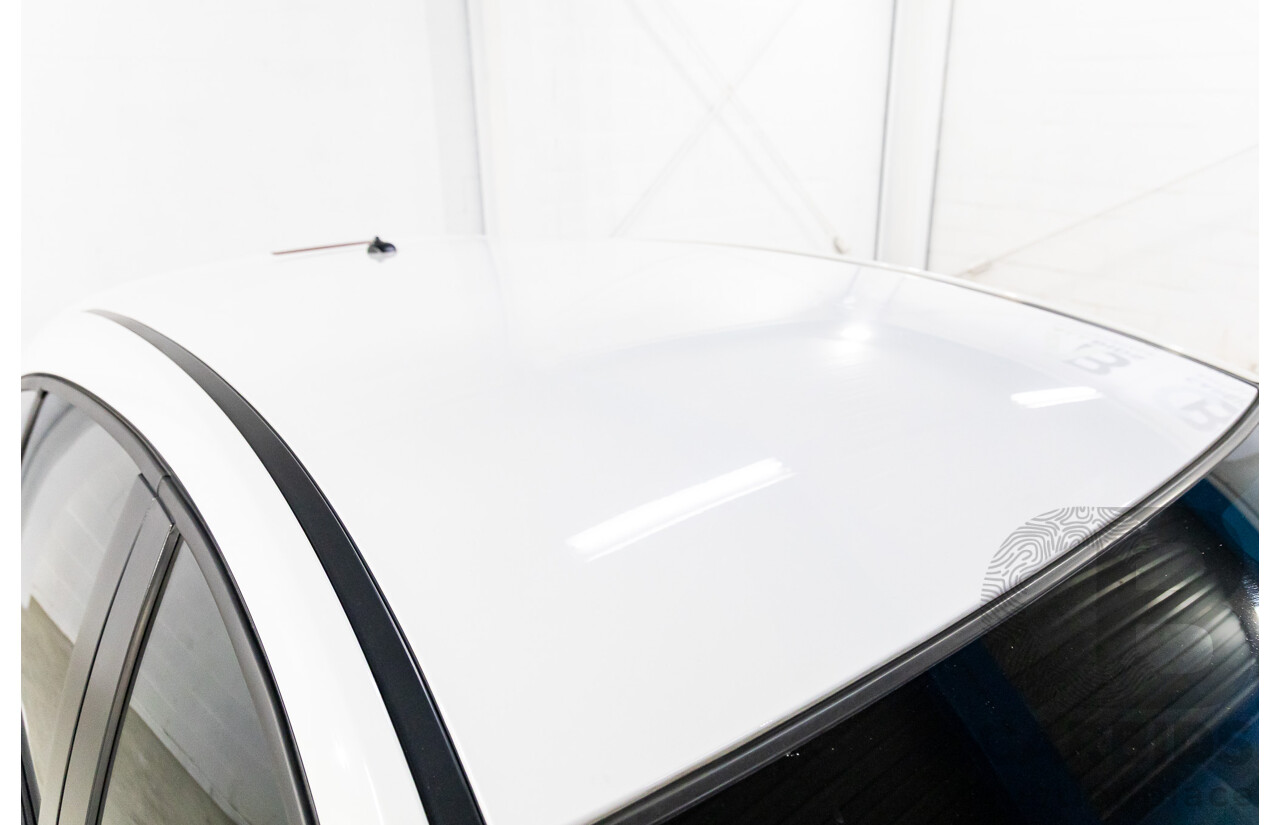 9/2015 Holden Cruze Equipe JH MY15 5d Hatchback White 1.8L