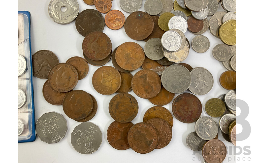 Collection of International Currency Including Australian Pennies/Half Pennies 1921-1964 2011 Ram's Head Dollar, China 1980 UNC Coin Wallet New Guinea, New Zealand, UK Malaysia, Hong Kong, Ireland