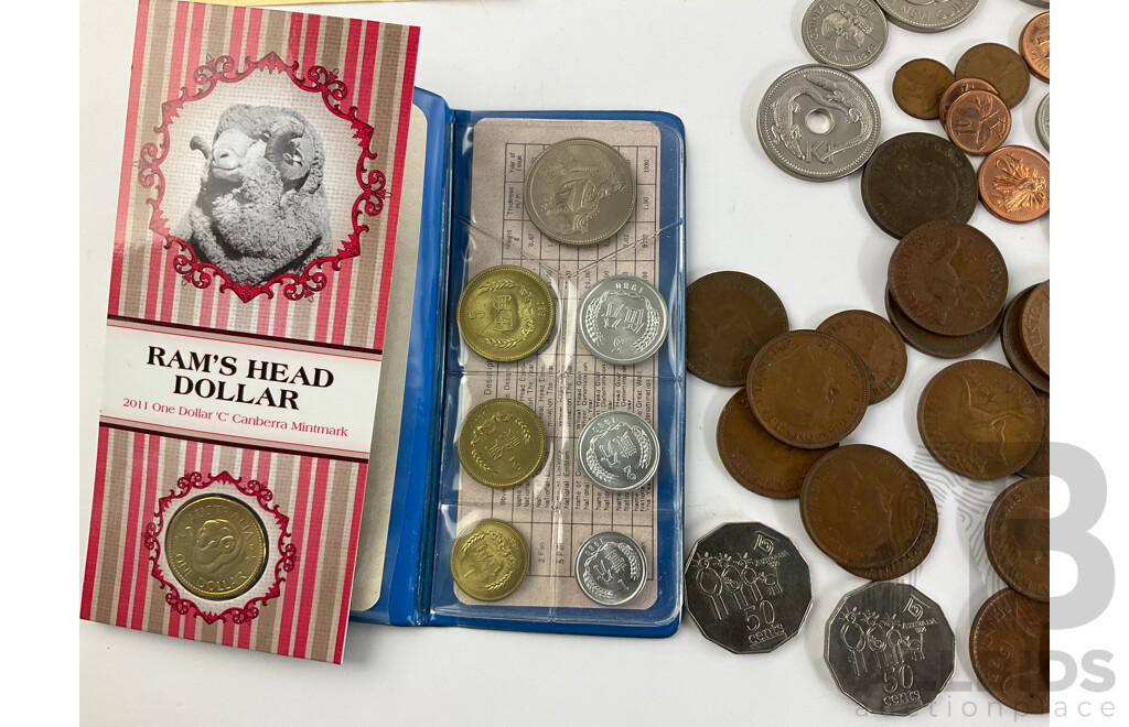 Collection of International Currency Including Australian Pennies/Half Pennies 1921-1964 2011 Ram's Head Dollar, China 1980 UNC Coin Wallet New Guinea, New Zealand, UK Malaysia, Hong Kong, Ireland