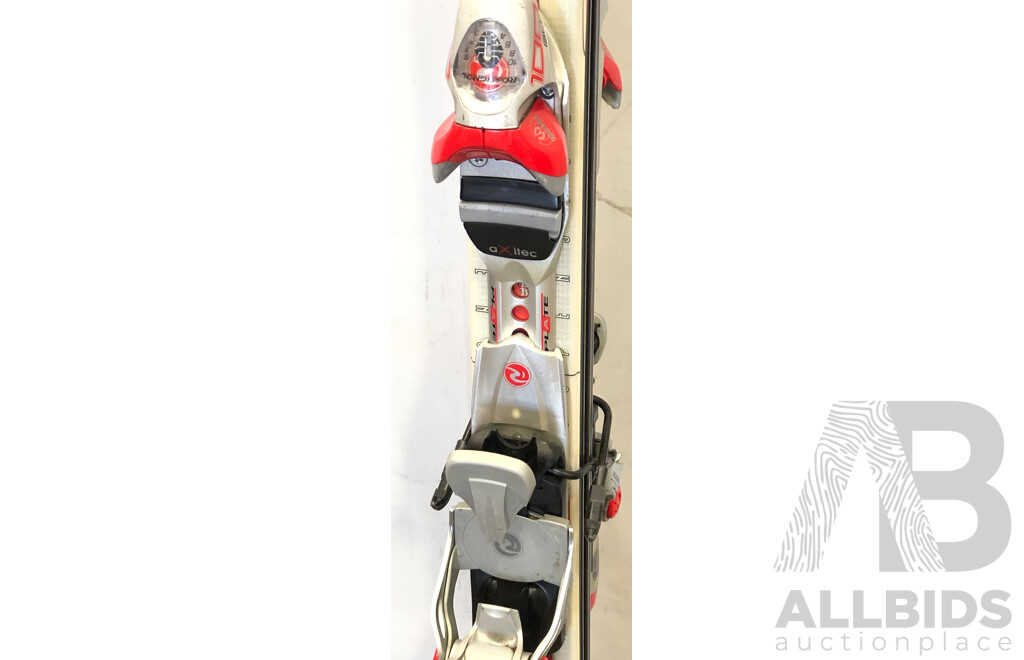 Two Sets of Skis, Two Sets of Poles and Two Pairs of Ski Boots
