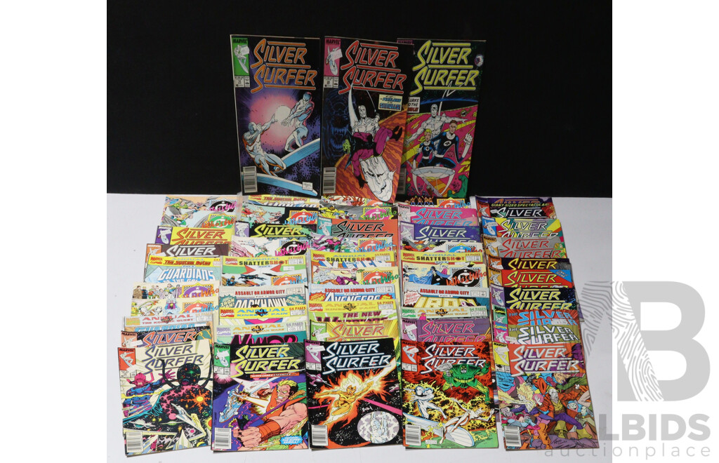 Collection of Marvel Comic Books - Who’s Who, the System Bytes, Shattershot, Silver Surfer, and More