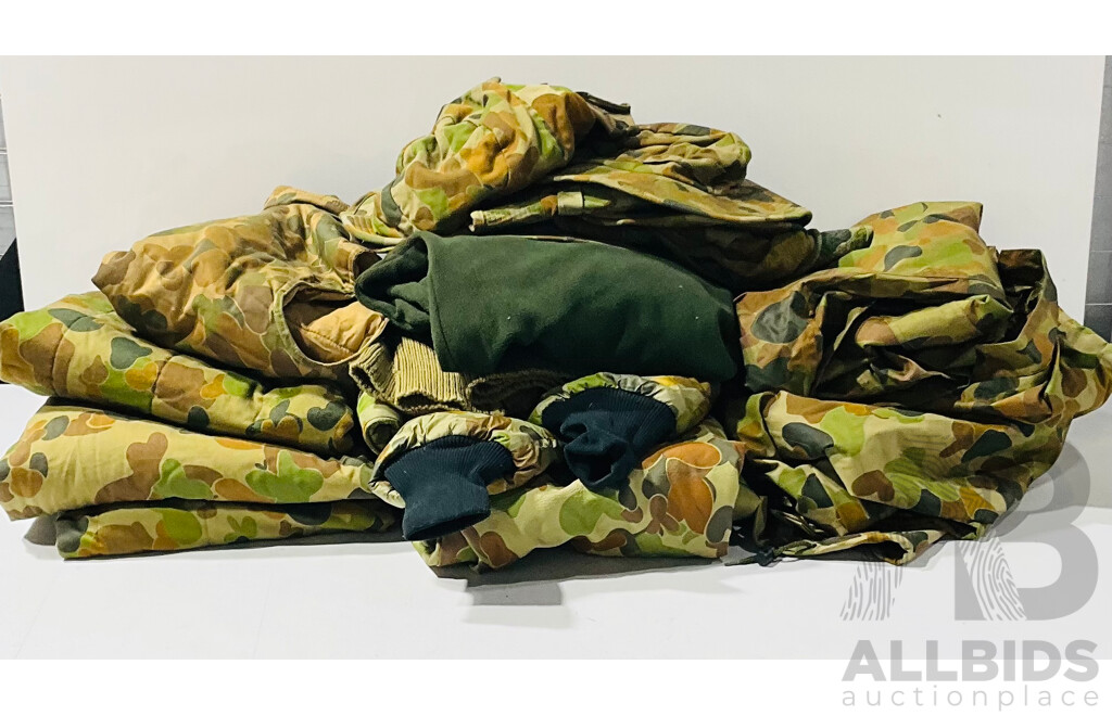 Collection of Military Clothing Including Shirts and Pants