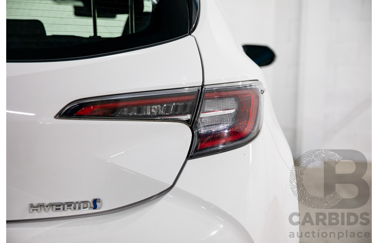 09/2020 Toyota Corolla Ascent Sport Hybrid (FWD) ZWE211R 5d Hatchback Glacier White 1.8L - Hybrid