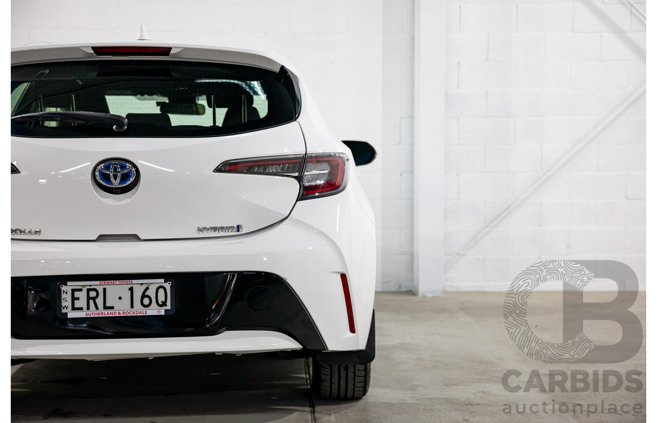09/2020 Toyota Corolla Ascent Sport Hybrid (FWD) ZWE211R 5d Hatchback Glacier White 1.8L - Hybrid