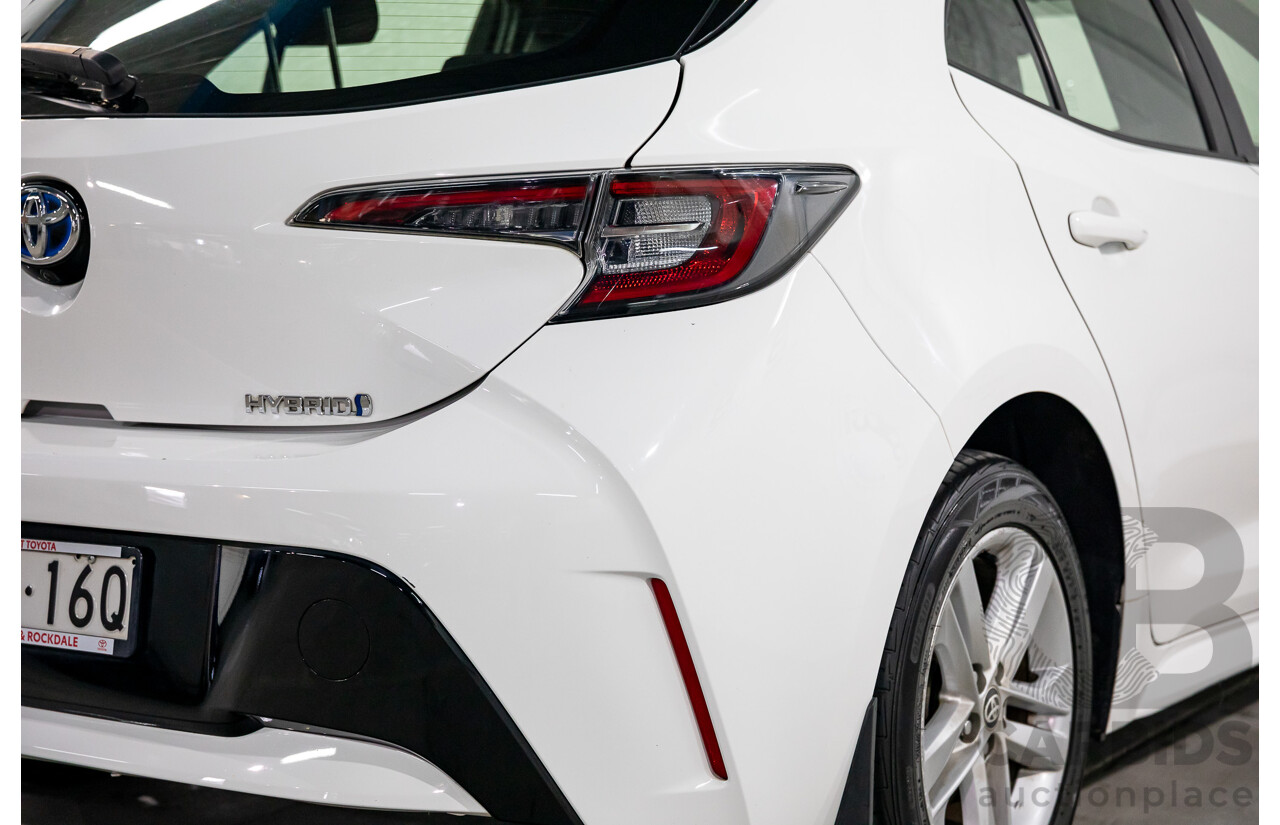 09/2020 Toyota Corolla Ascent Sport Hybrid (FWD) ZWE211R 5d Hatchback Glacier White 1.8L - Hybrid