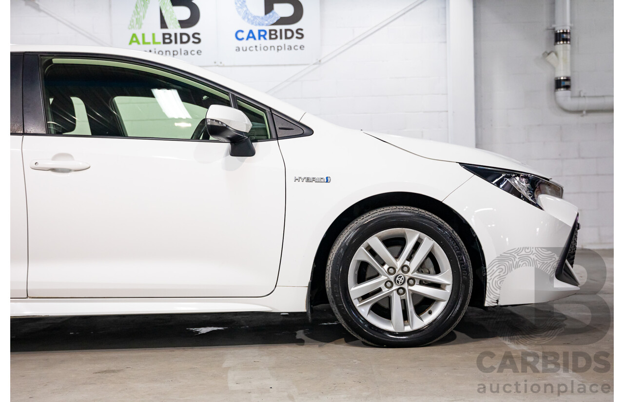 09/2020 Toyota Corolla Ascent Sport Hybrid (FWD) ZWE211R 5d Hatchback Glacier White 1.8L - Hybrid