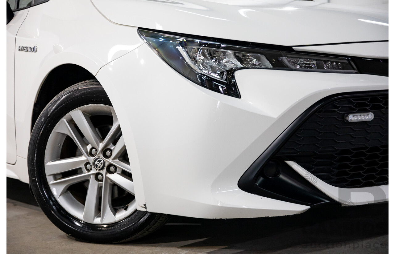 09/2020 Toyota Corolla Ascent Sport Hybrid (FWD) ZWE211R 5d Hatchback Glacier White 1.8L - Hybrid