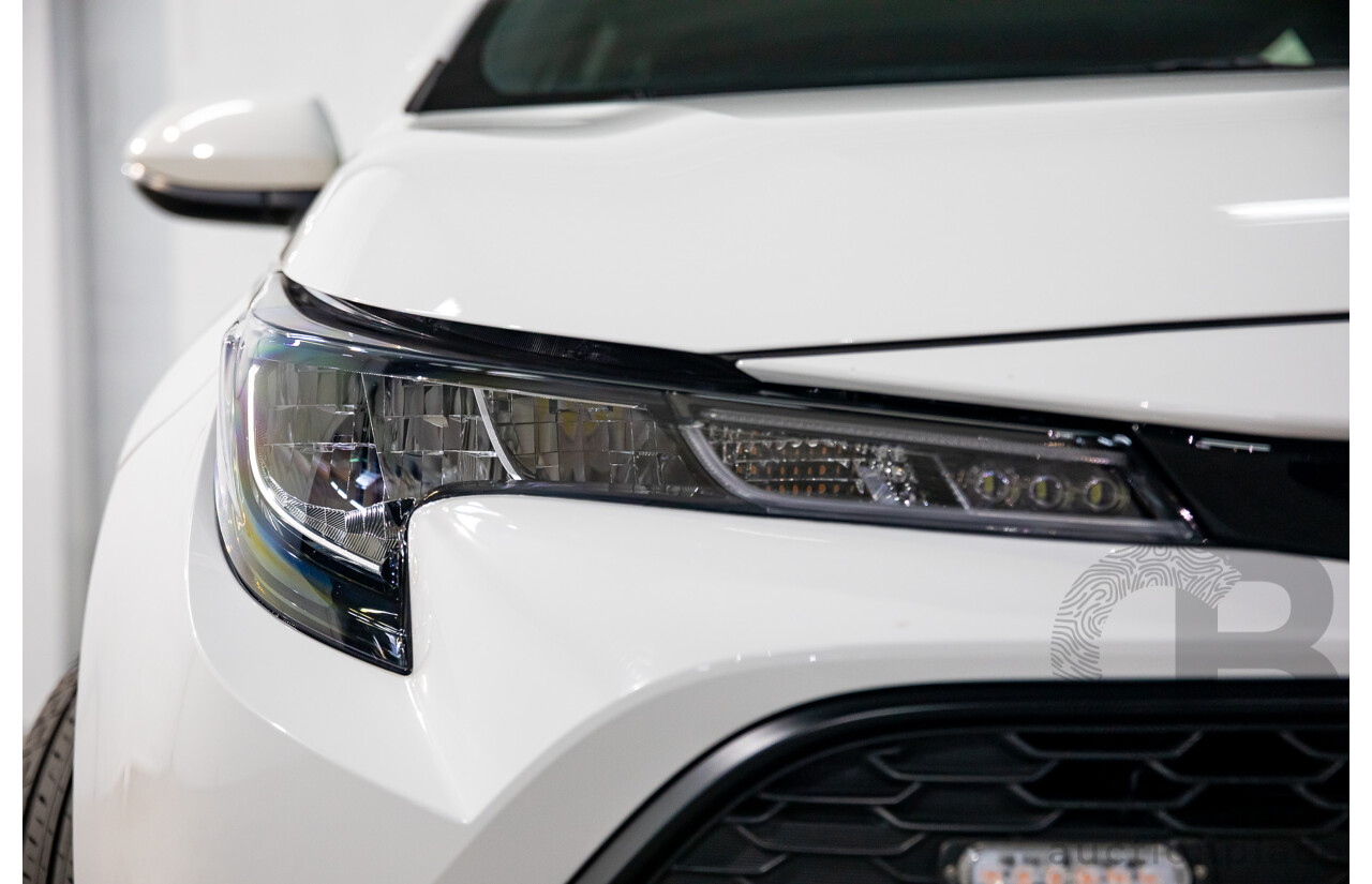 09/2020 Toyota Corolla Ascent Sport Hybrid (FWD) ZWE211R 5d Hatchback Glacier White 1.8L - Hybrid