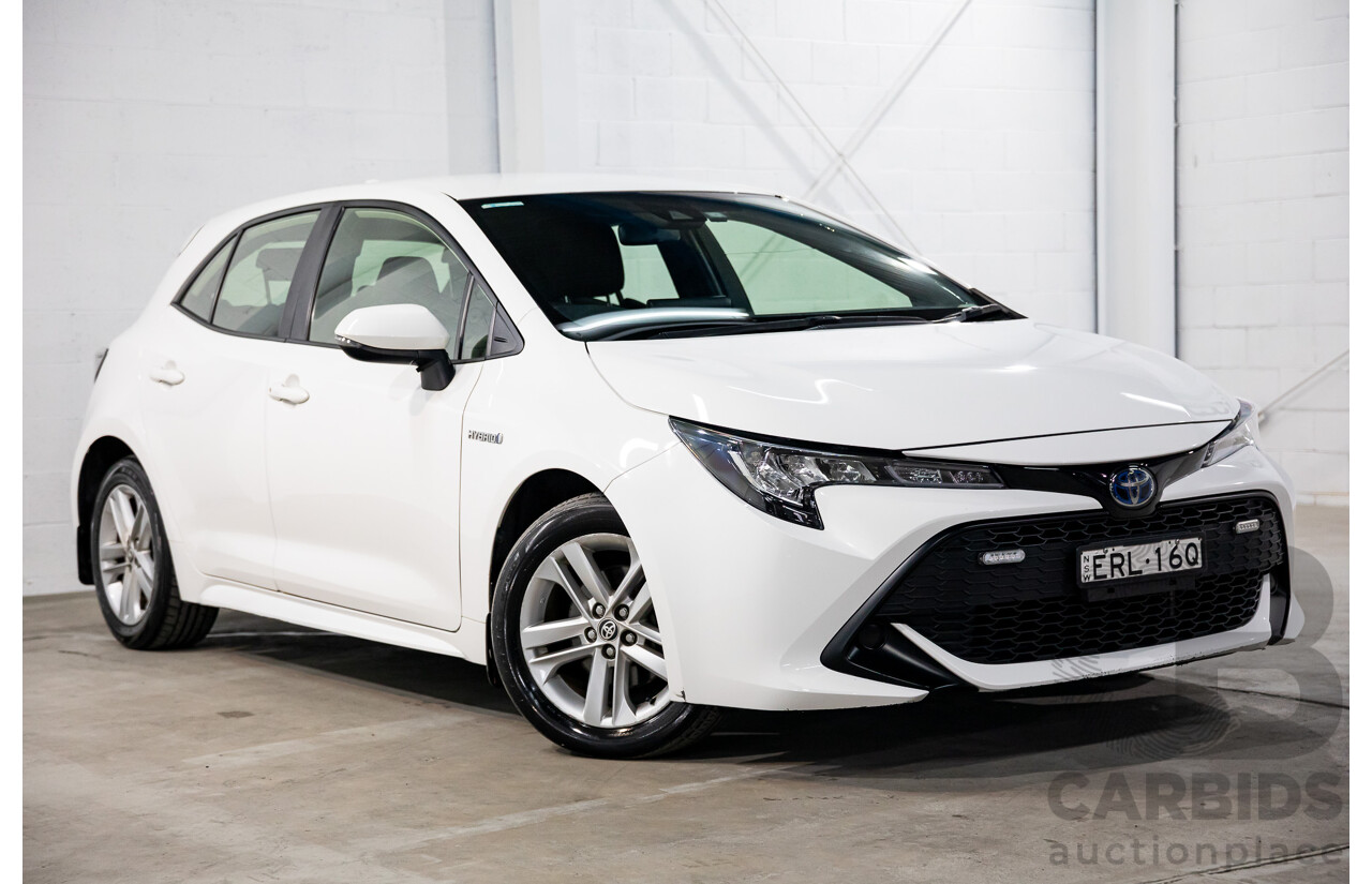 09/2020 Toyota Corolla Ascent Sport Hybrid (FWD) ZWE211R 5d Hatchback Glacier White 1.8L - Hybrid