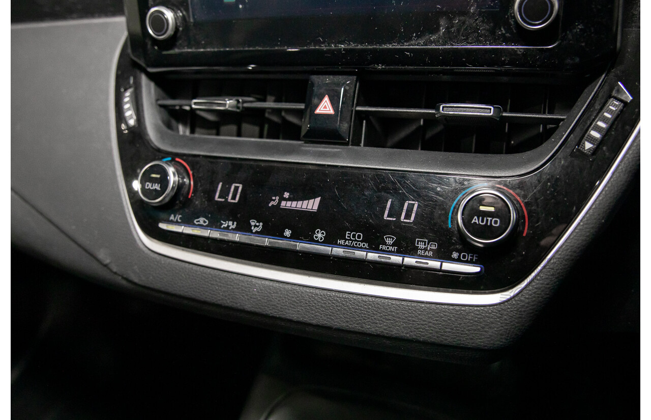 09/2020 Toyota Corolla Ascent Sport Hybrid (FWD) ZWE211R 5d Hatchback Glacier White 1.8L - Hybrid