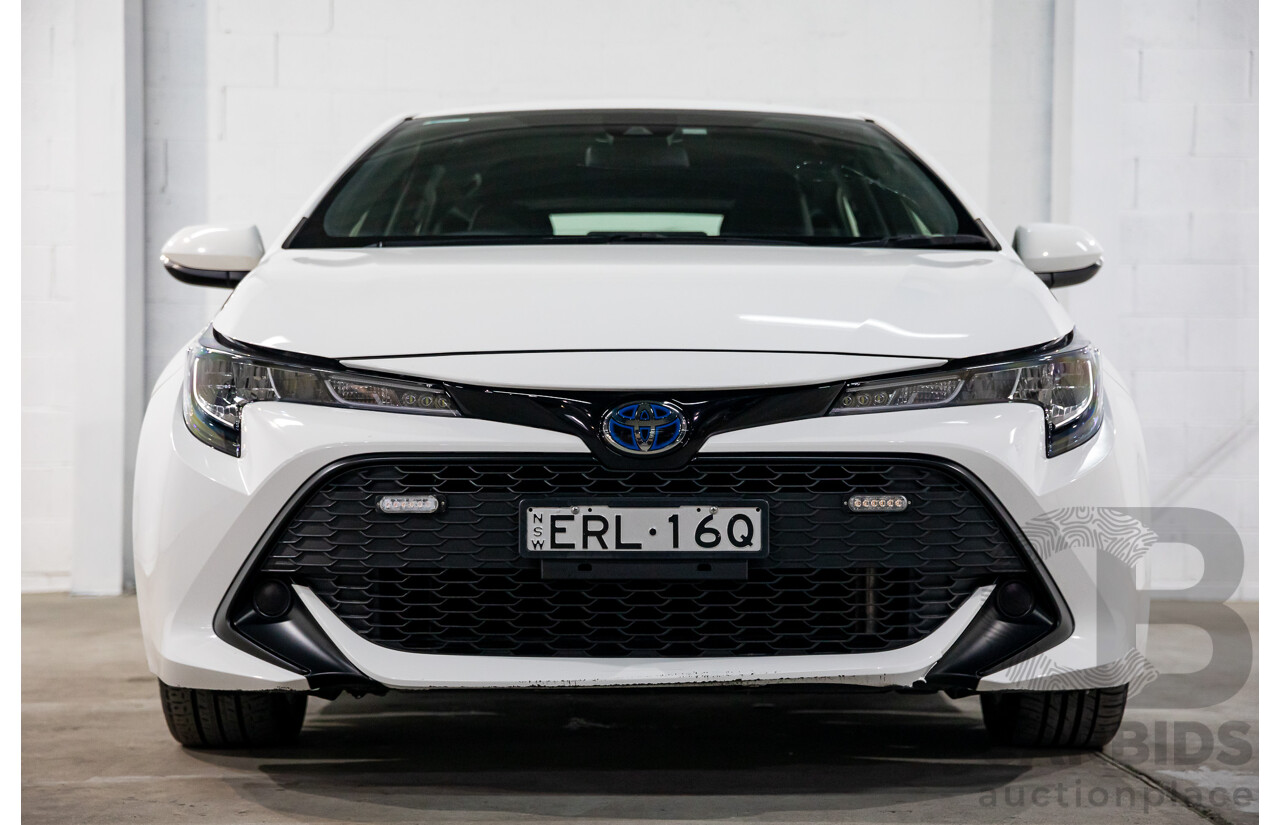 09/2020 Toyota Corolla Ascent Sport Hybrid (FWD) ZWE211R 5d Hatchback Glacier White 1.8L - Hybrid
