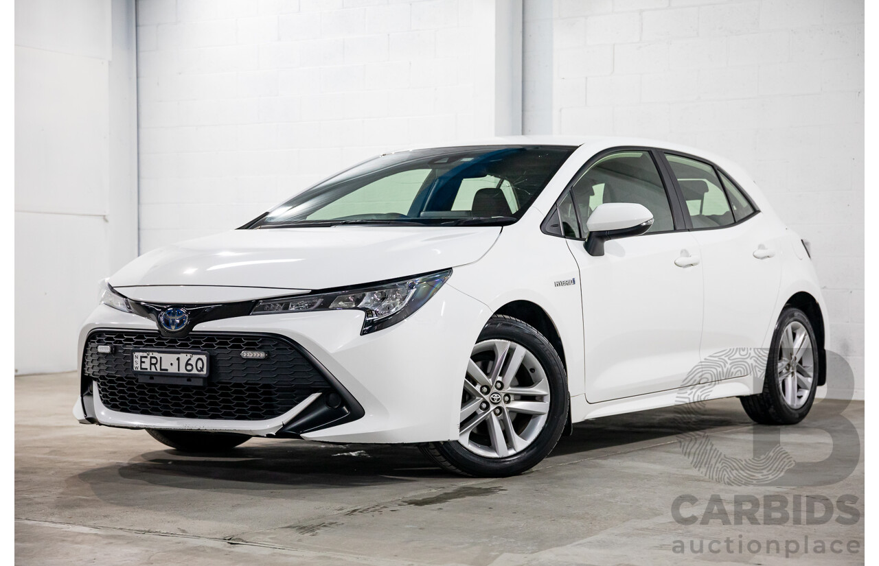 09/2020 Toyota Corolla Ascent Sport Hybrid (FWD) ZWE211R 5d Hatchback Glacier White 1.8L - Hybrid