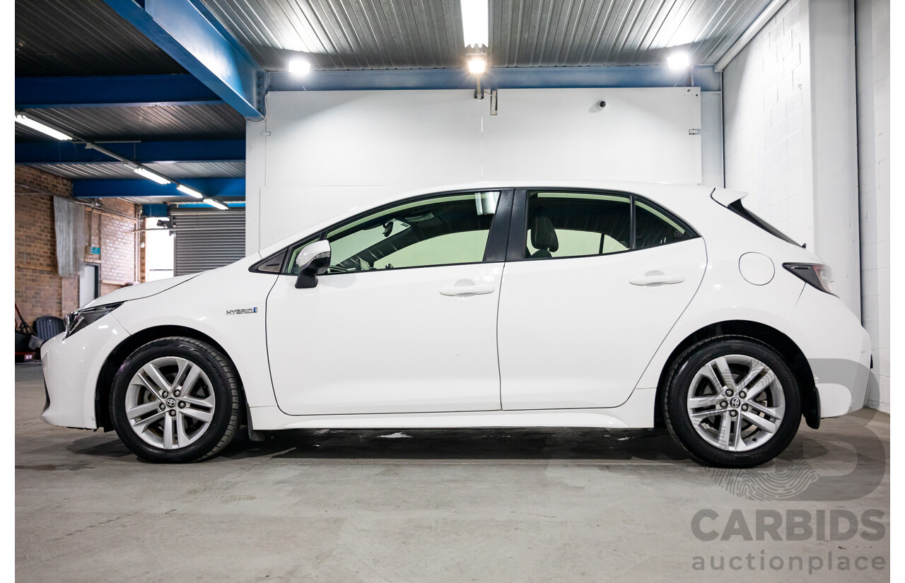 09/2020 Toyota Corolla Ascent Sport Hybrid (FWD) ZWE211R 5d Hatchback Glacier White 1.8L - Hybrid