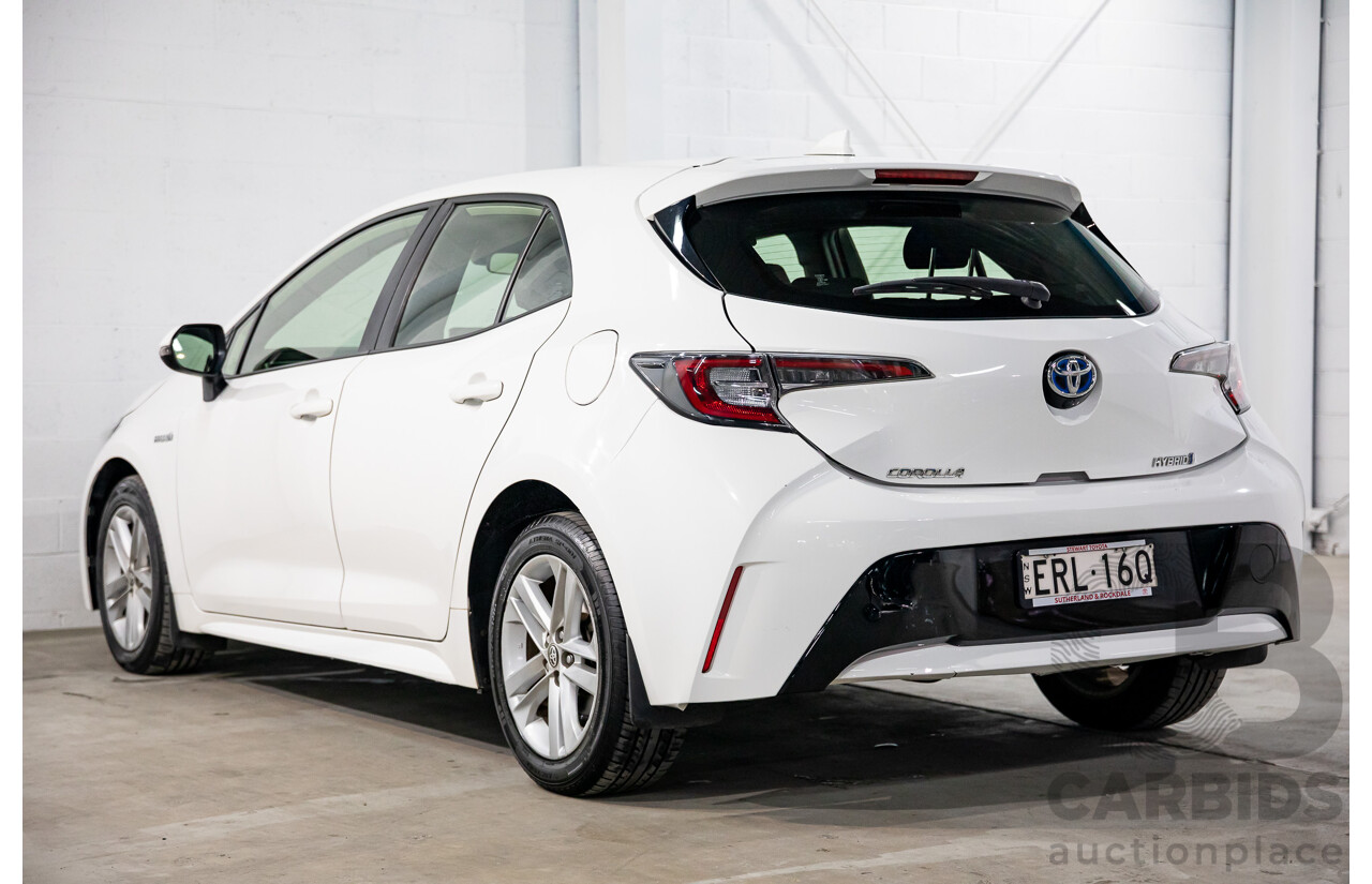 09/2020 Toyota Corolla Ascent Sport Hybrid (FWD) ZWE211R 5d Hatchback Glacier White 1.8L - Hybrid