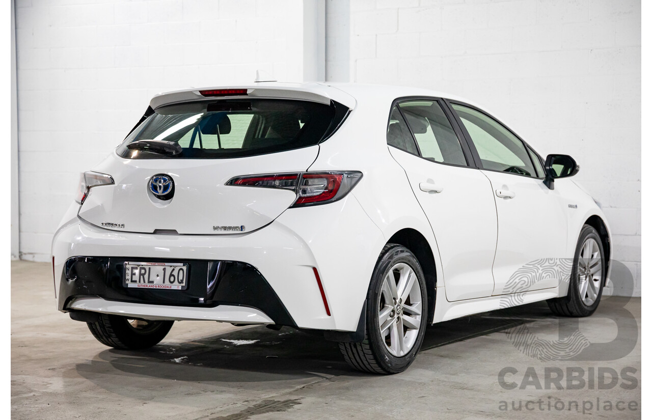 09/2020 Toyota Corolla Ascent Sport Hybrid (FWD) ZWE211R 5d Hatchback Glacier White 1.8L - Hybrid