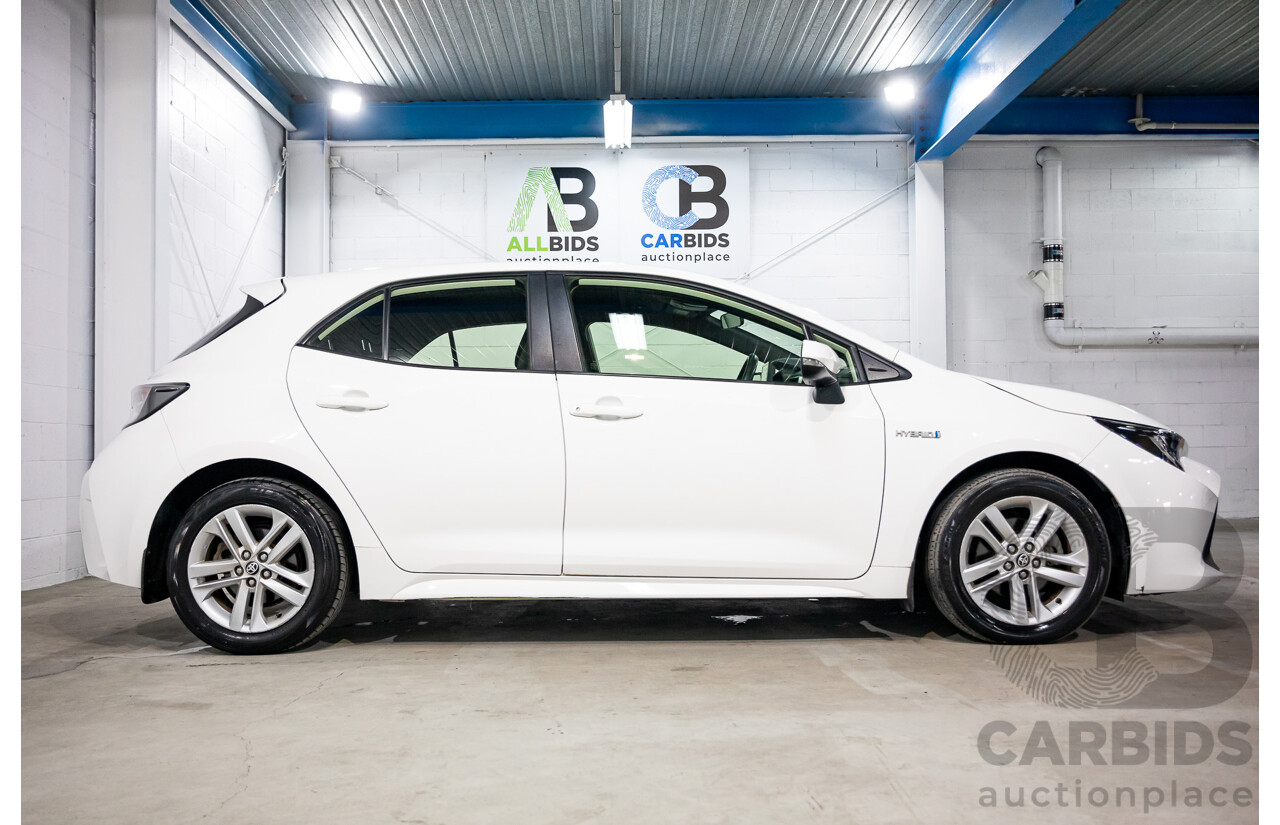 09/2020 Toyota Corolla Ascent Sport Hybrid (FWD) ZWE211R 5d Hatchback Glacier White 1.8L - Hybrid