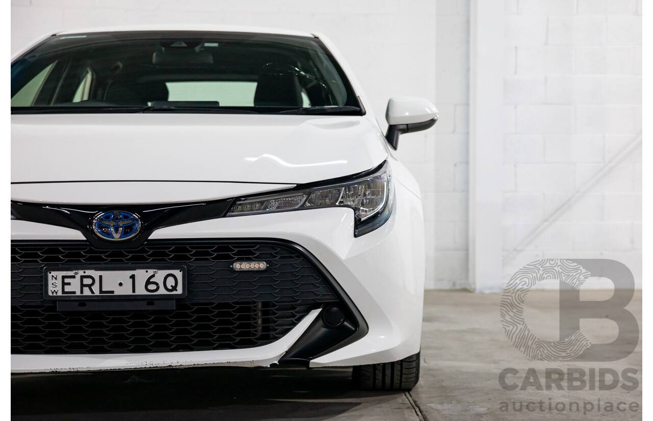 09/2020 Toyota Corolla Ascent Sport Hybrid (FWD) ZWE211R 5d Hatchback Glacier White 1.8L - Hybrid