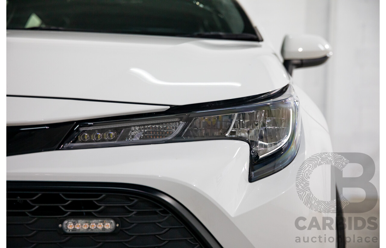09/2020 Toyota Corolla Ascent Sport Hybrid (FWD) ZWE211R 5d Hatchback Glacier White 1.8L - Hybrid