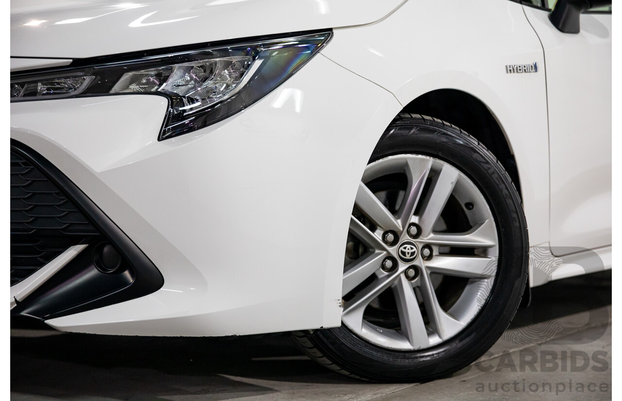 09/2020 Toyota Corolla Ascent Sport Hybrid (FWD) ZWE211R 5d Hatchback Glacier White 1.8L - Hybrid