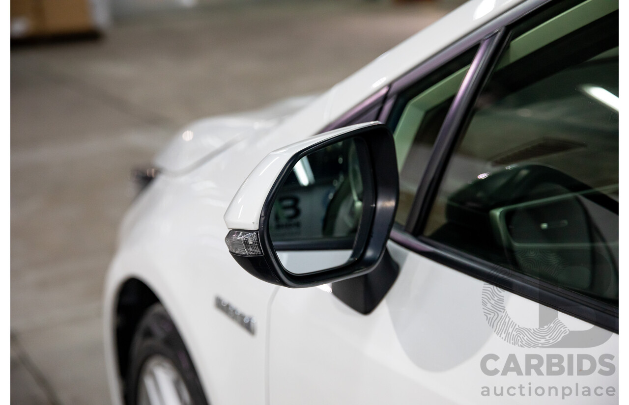 09/2020 Toyota Corolla Ascent Sport Hybrid (FWD) ZWE211R 5d Hatchback Glacier White 1.8L - Hybrid