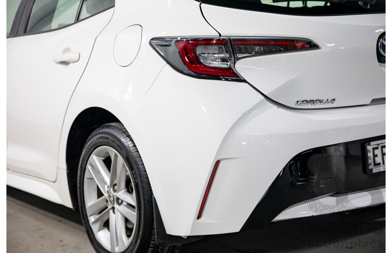 09/2020 Toyota Corolla Ascent Sport Hybrid (FWD) ZWE211R 5d Hatchback Glacier White 1.8L - Hybrid