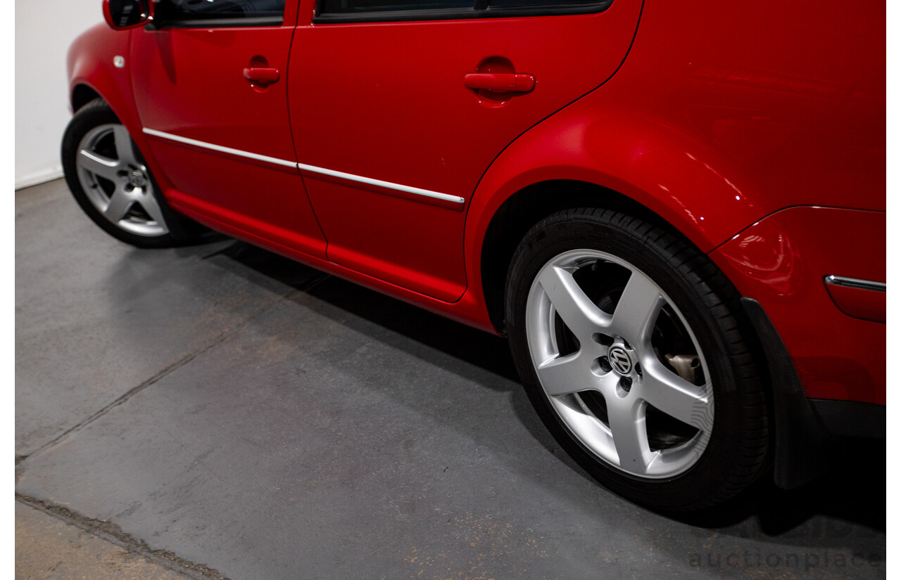 7/2005 Volkswagen Bora 2.3L V5 1J 4d Sedan Tornado Red 2.3L