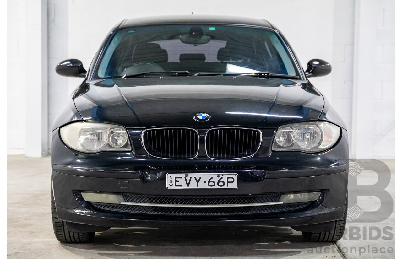 2/2009 BMW 120i E87 MY09 5d Hatchback Jet Black 2.0L