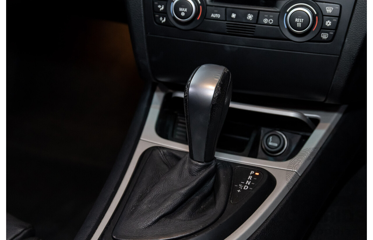 2/2009 BMW 120i E87 MY09 5d Hatchback Jet Black 2.0L