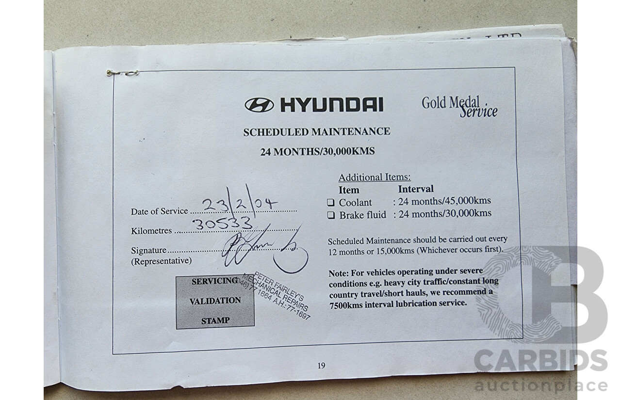 11/2002 Hyundai Elantra Lavita GLS FC 5d Hatchback Fawn 1.8L