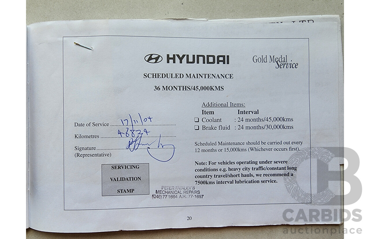 11/2002 Hyundai Elantra Lavita GLS FC 5d Hatchback Fawn 1.8L