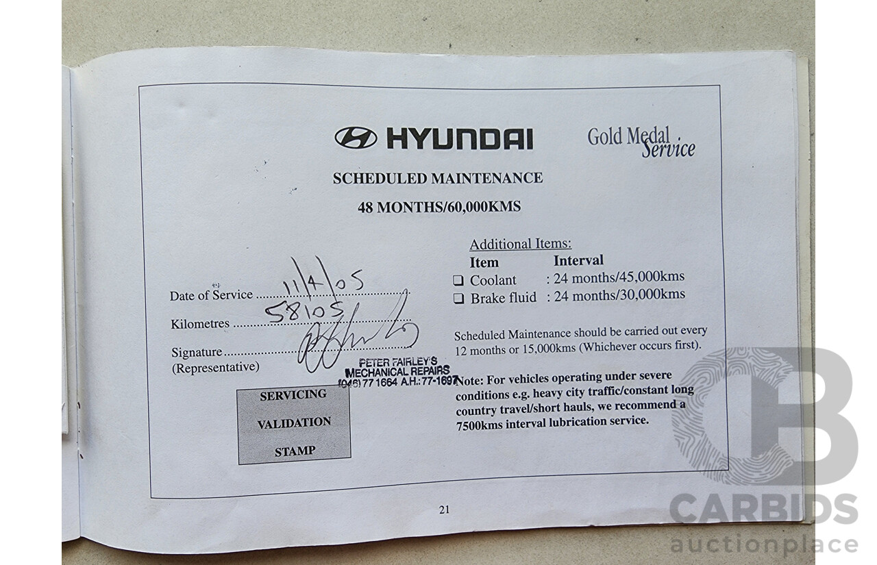 11/2002 Hyundai Elantra Lavita GLS FC 5d Hatchback Fawn 1.8L