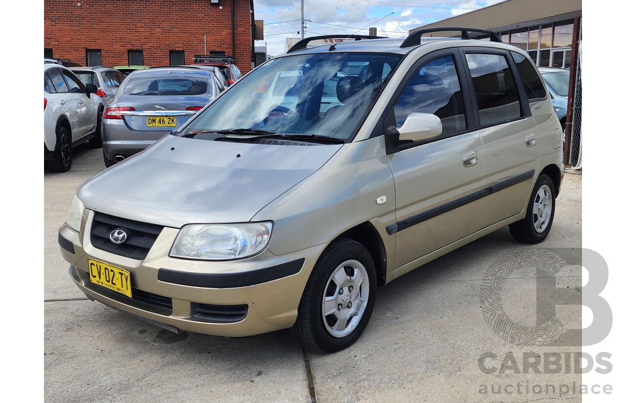 11/2002 Hyundai Elantra Lavita GLS FC 5d Hatchback Fawn 1.8L