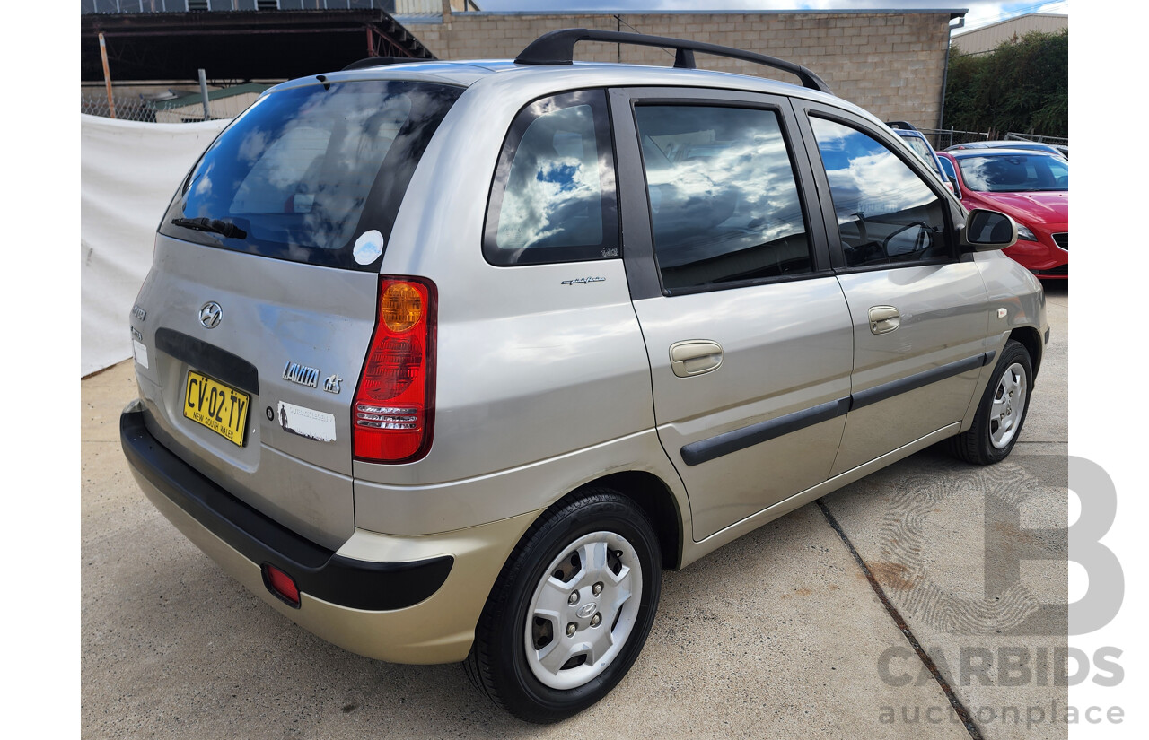 11/2002 Hyundai Elantra Lavita GLS FC 5d Hatchback Fawn 1.8L