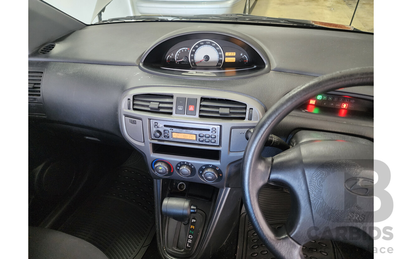 11/2002 Hyundai Elantra Lavita GLS FC 5d Hatchback Fawn 1.8L