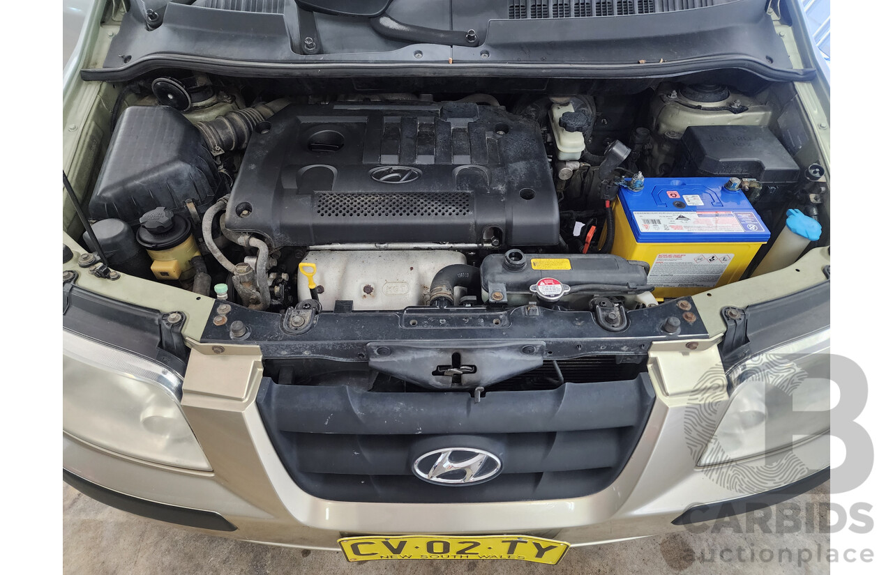 11/2002 Hyundai Elantra Lavita GLS FC 5d Hatchback Fawn 1.8L