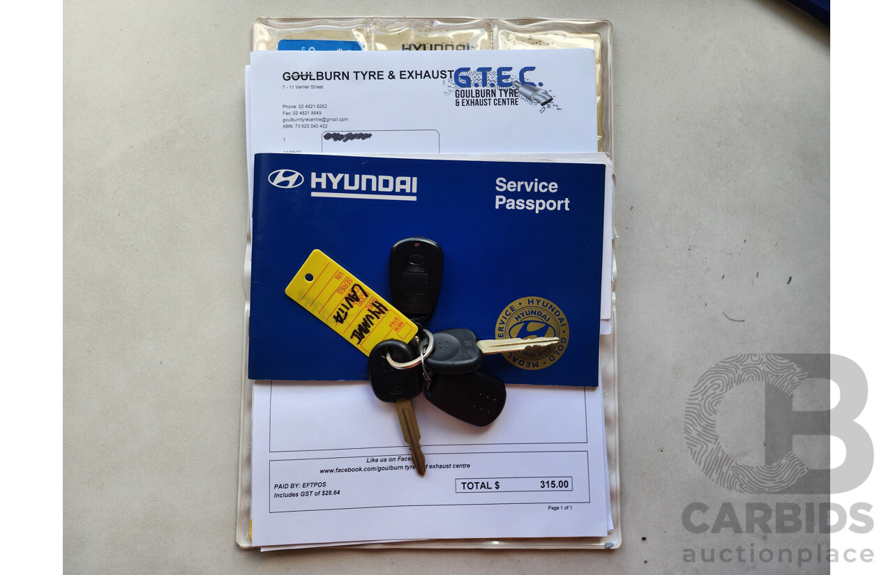 11/2002 Hyundai Elantra Lavita GLS FC 5d Hatchback Fawn 1.8L