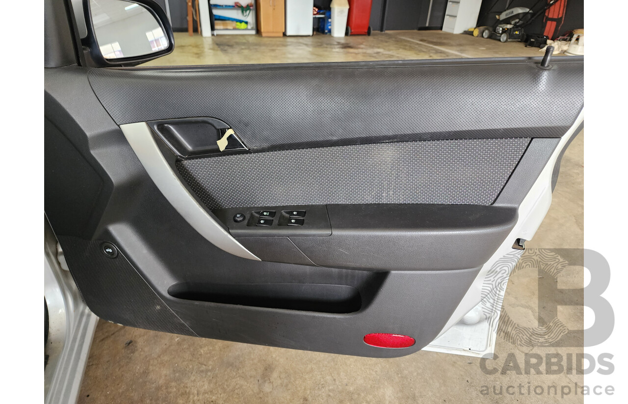 4/2012 Holden Barina Classic TK MY11 4d Sedan Silver 1.6L