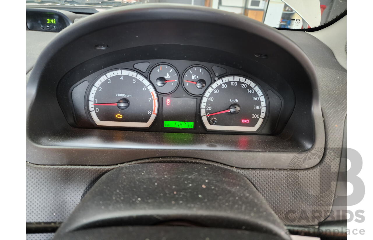 4/2012 Holden Barina Classic TK MY11 4d Sedan Silver 1.6L